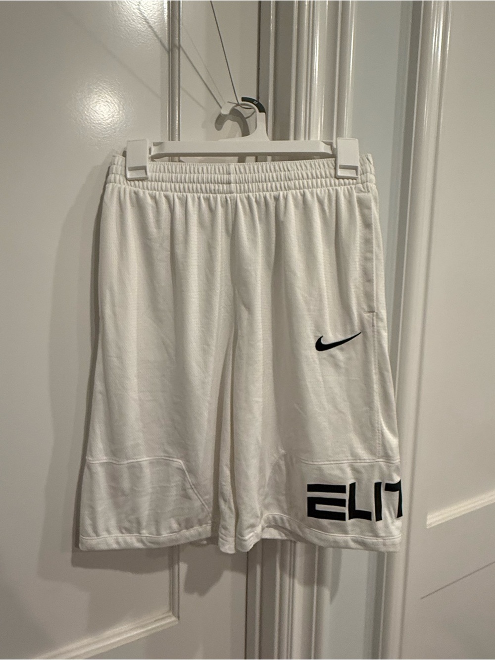Nike White Kids Athletic Shorts with Black Swoosh